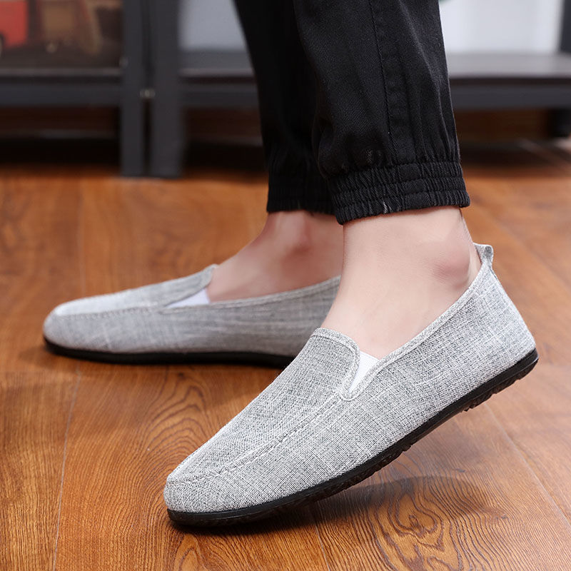 Premium suede loafer black sole side view