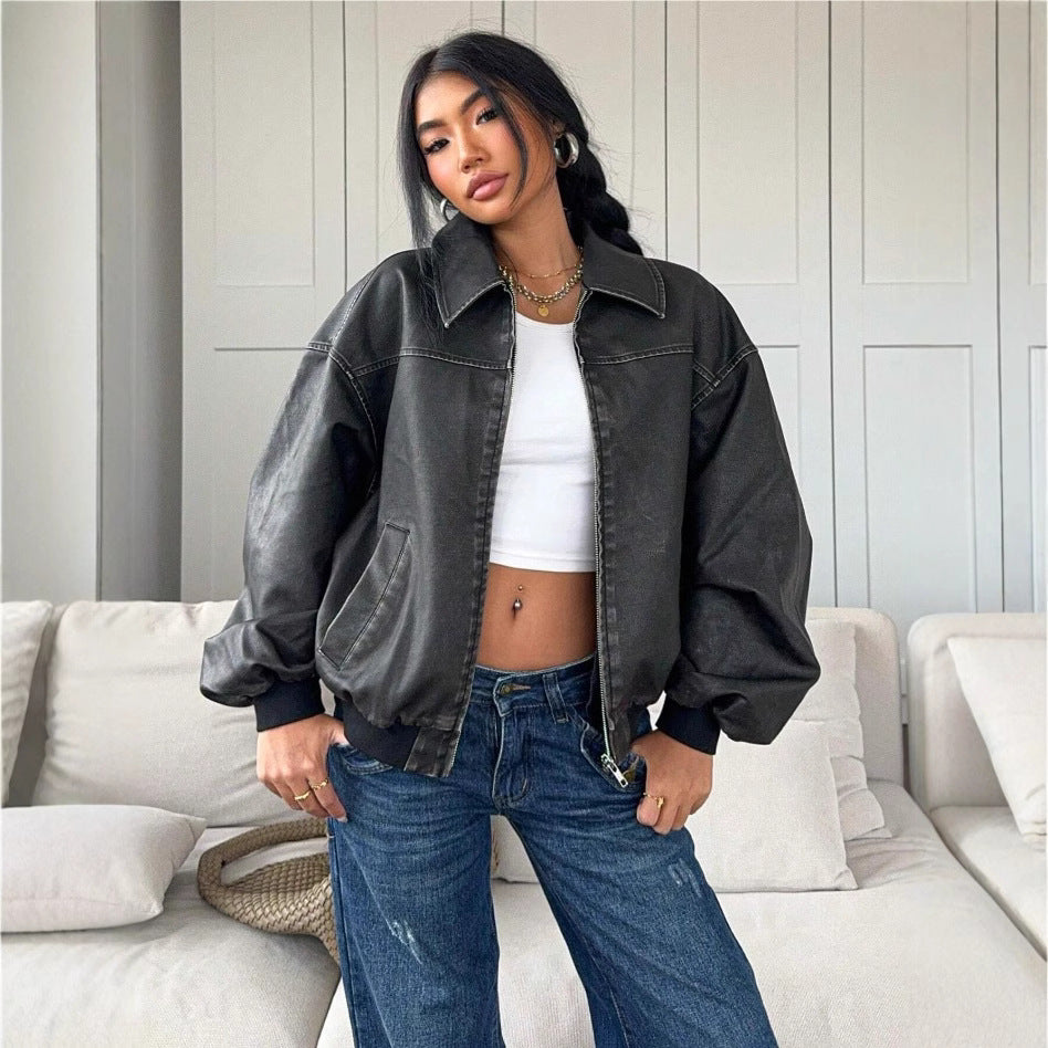 Women's distressed leather jacket detail