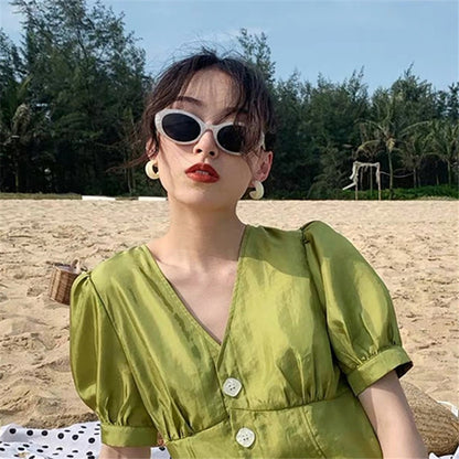 Sylvie oval sunglasses front view flat lay