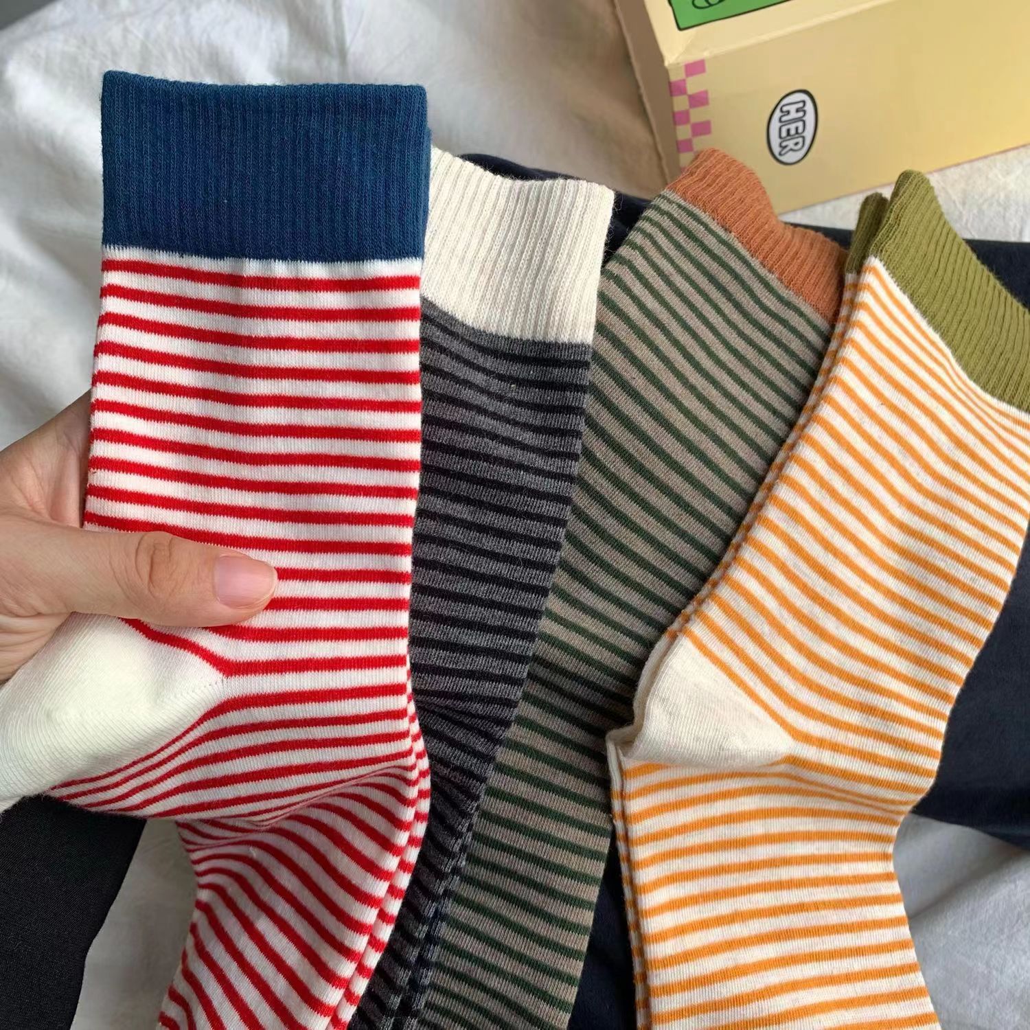Ruffled polka dot socks on feet