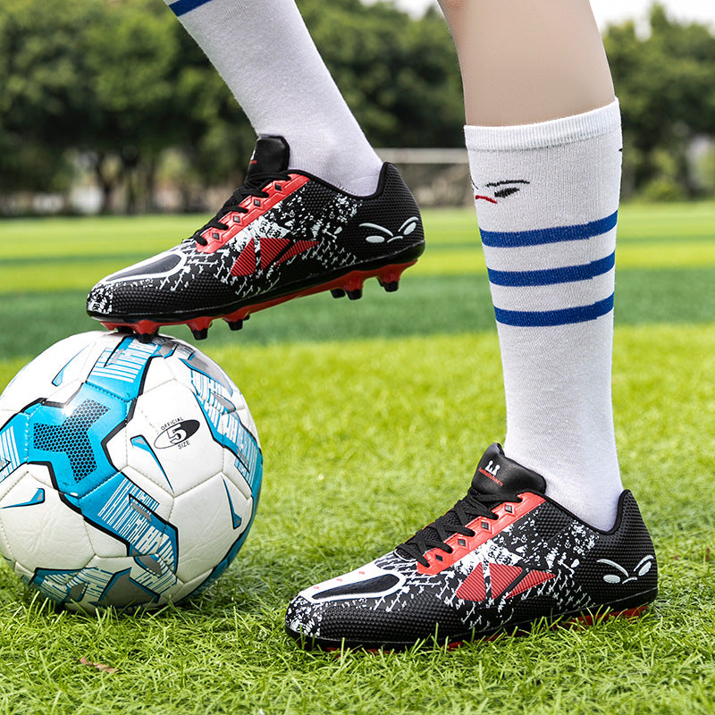 Non-slip football boots side view