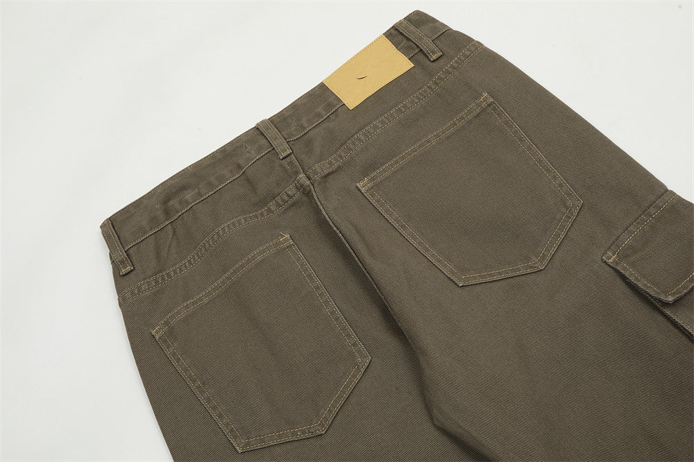Men's slightly flared jeans close-up detail