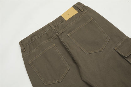 Men's slightly flared jeans close-up detail