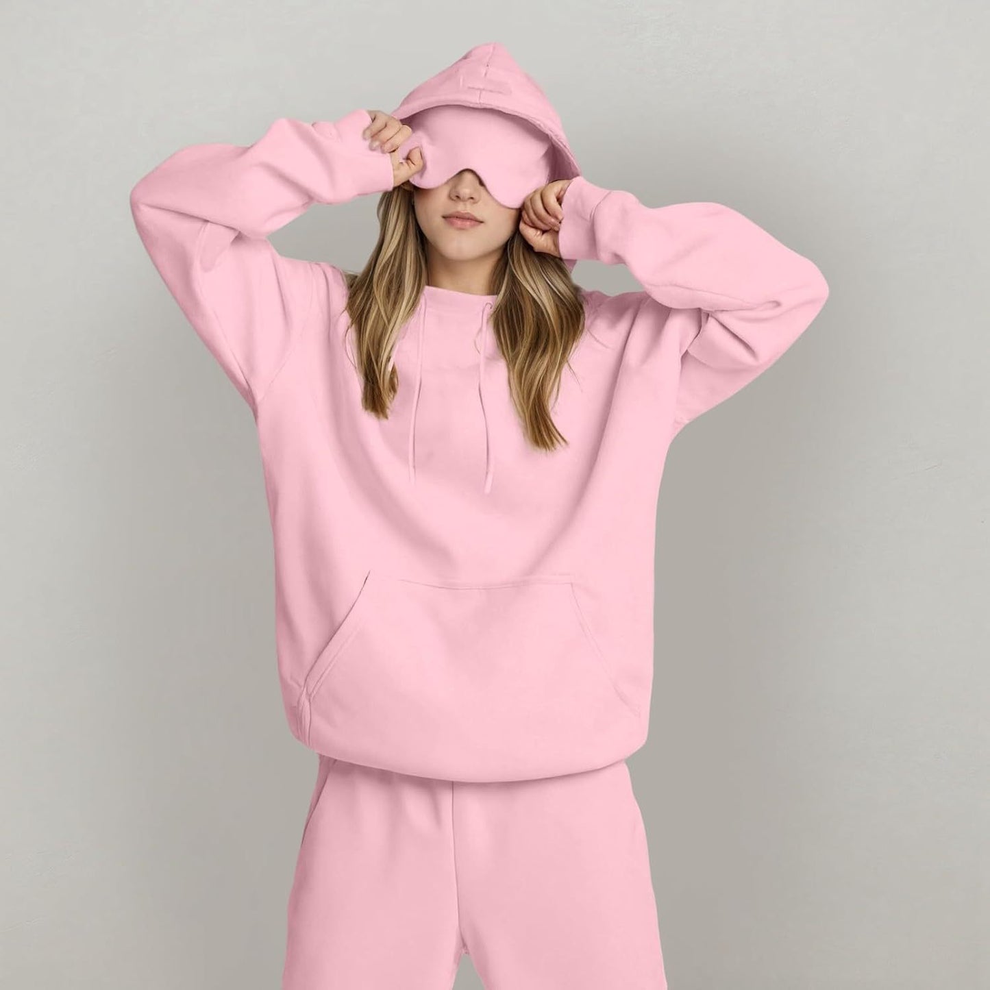 Solid hooded top styled
