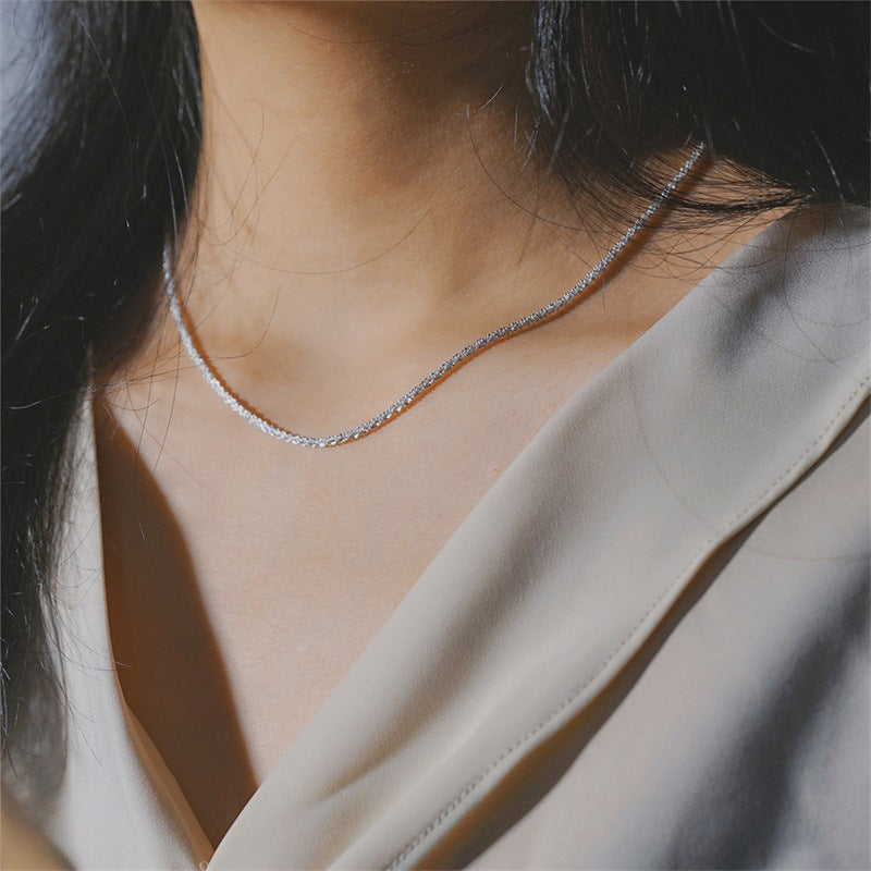 Serene sleek chain necklace detail close-up