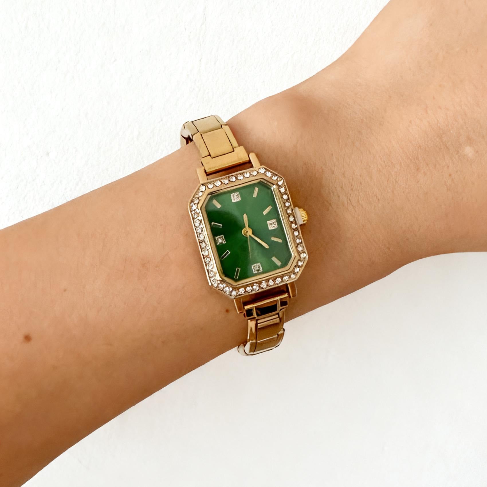 Diamond-embellished watch dial close-up