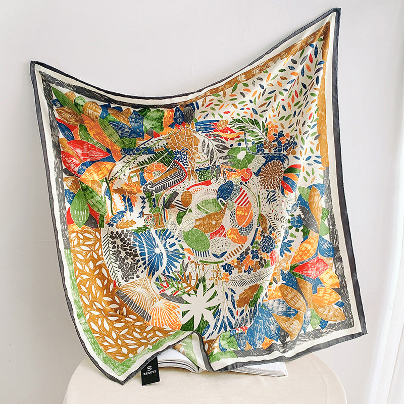 Garden silk scarf folded flat lay