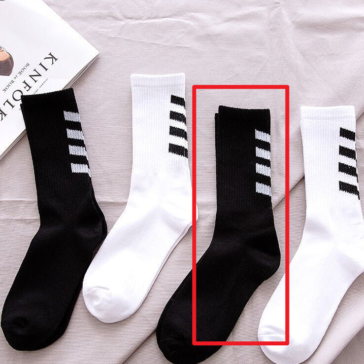Athletic mid socks on feet
