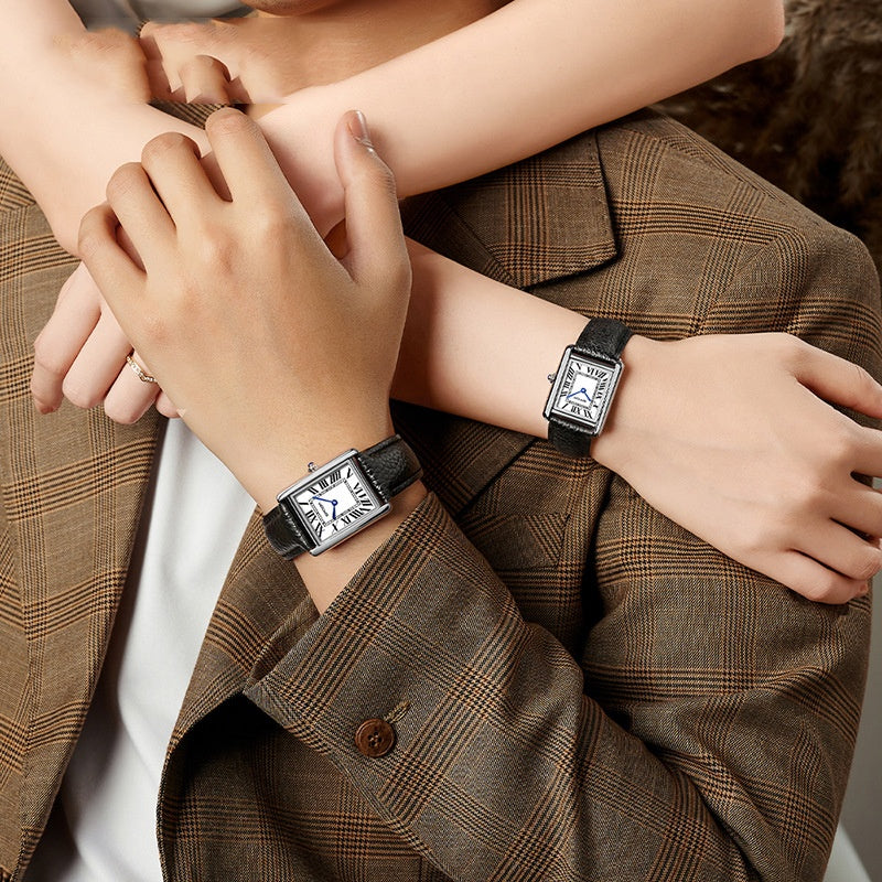 Roman scale couple watch side view