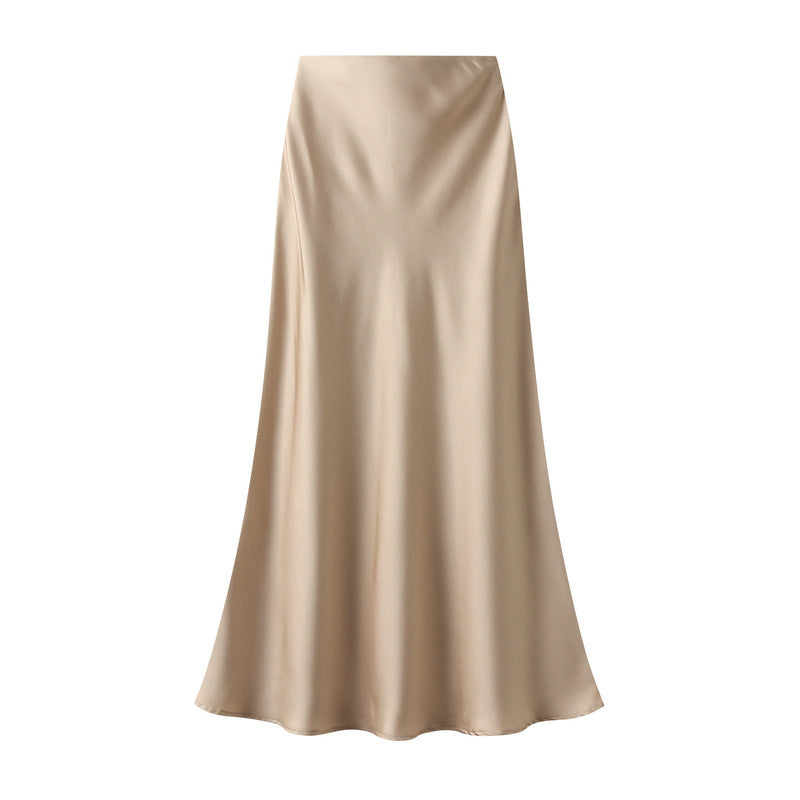 Beige satin skirt on a white background
