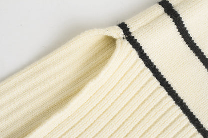 Women's chic knit sweater side view