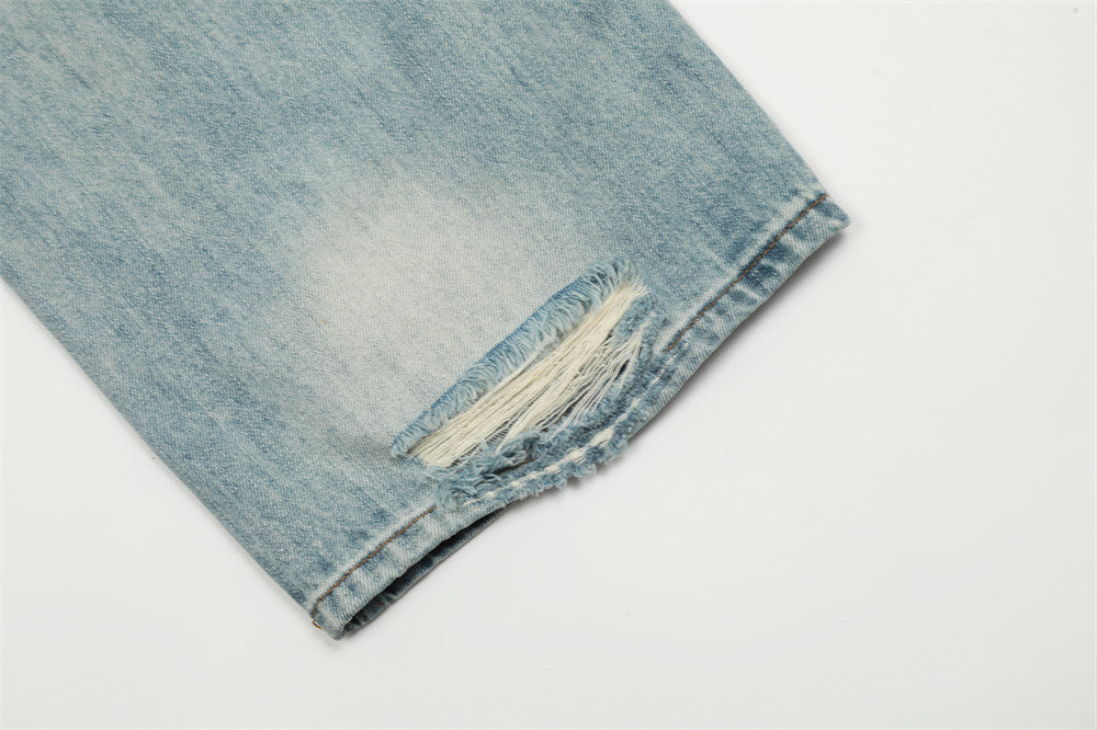 Men's vintage washed straight jeans fabric close-up