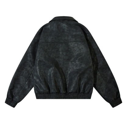 Men's vintage distressed leather jacket close-up detail