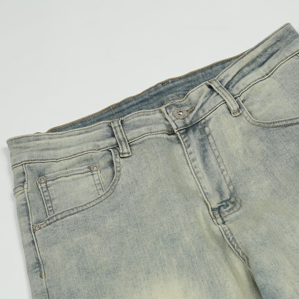 Men's washed printed jeans close-up detail