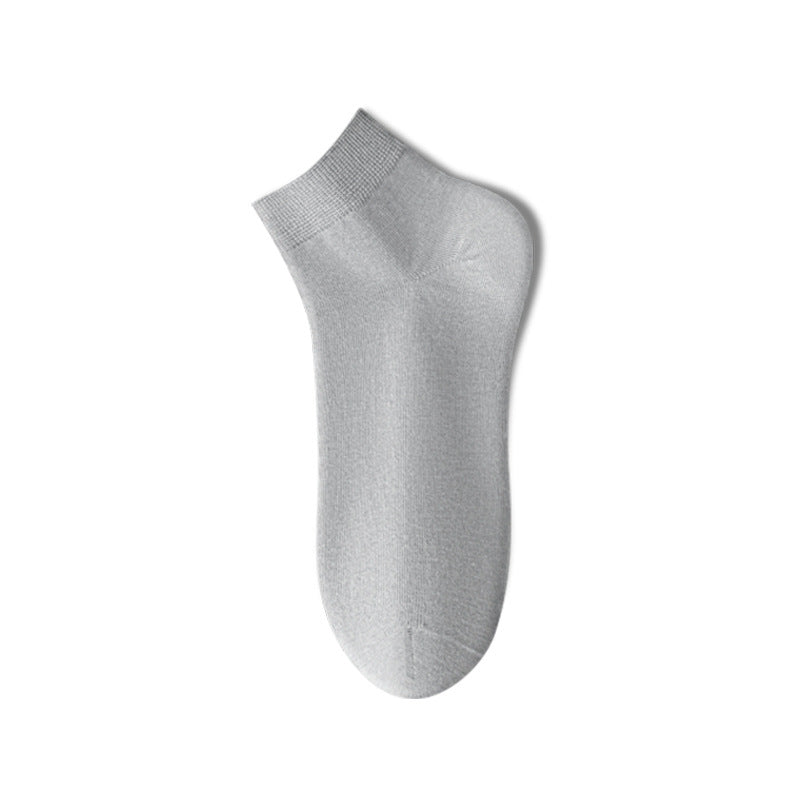 Odor-absorbent mid socks on feet