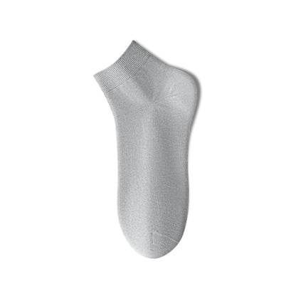 Odor-absorbent mid socks on feet
