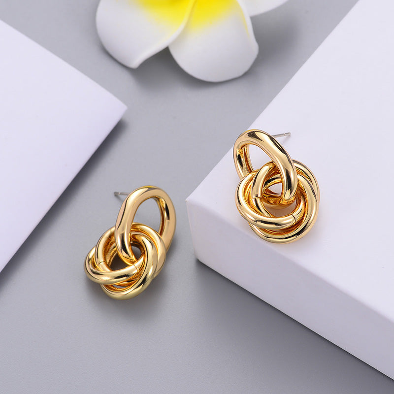 Aurelia knot stud earrings lifestyle shot