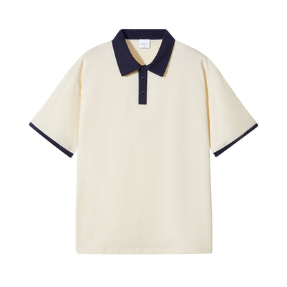 Beige polo shirt with navy trim on a white background