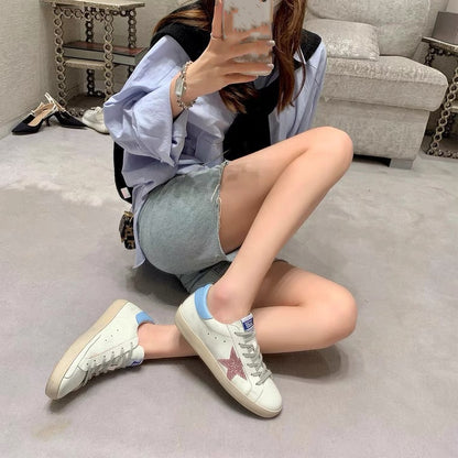 Women's high star sneakers side view
