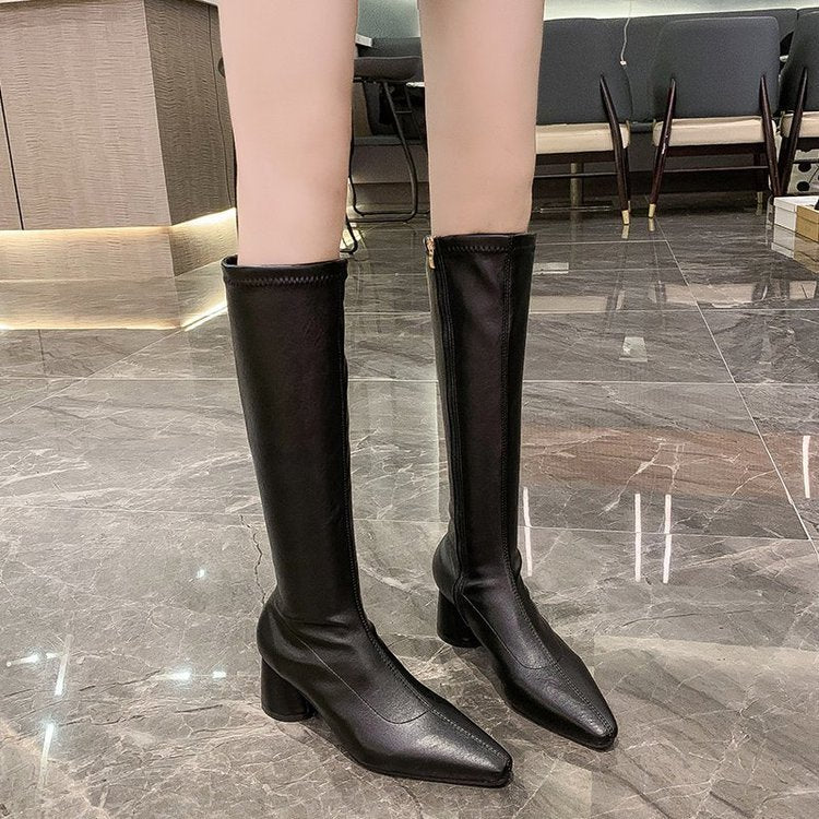 Retro pointed knight boots back view