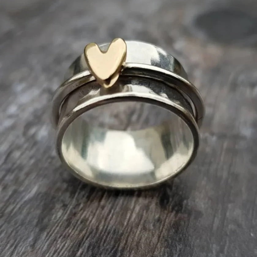 Peach heart decompression ring side view