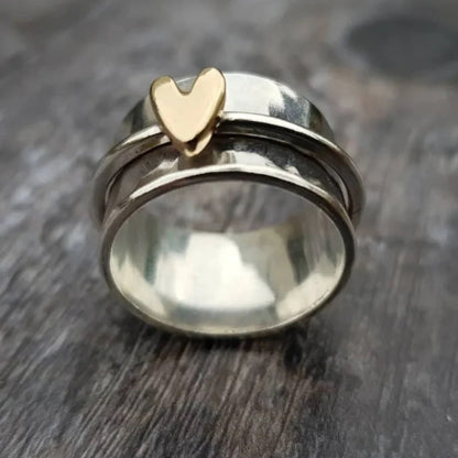 Peach heart decompression ring side view