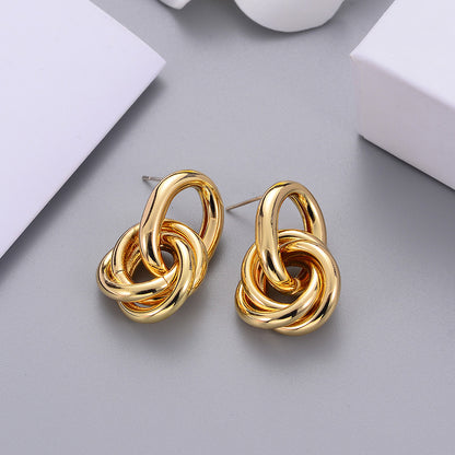 Aurelia knot stud earrings on model