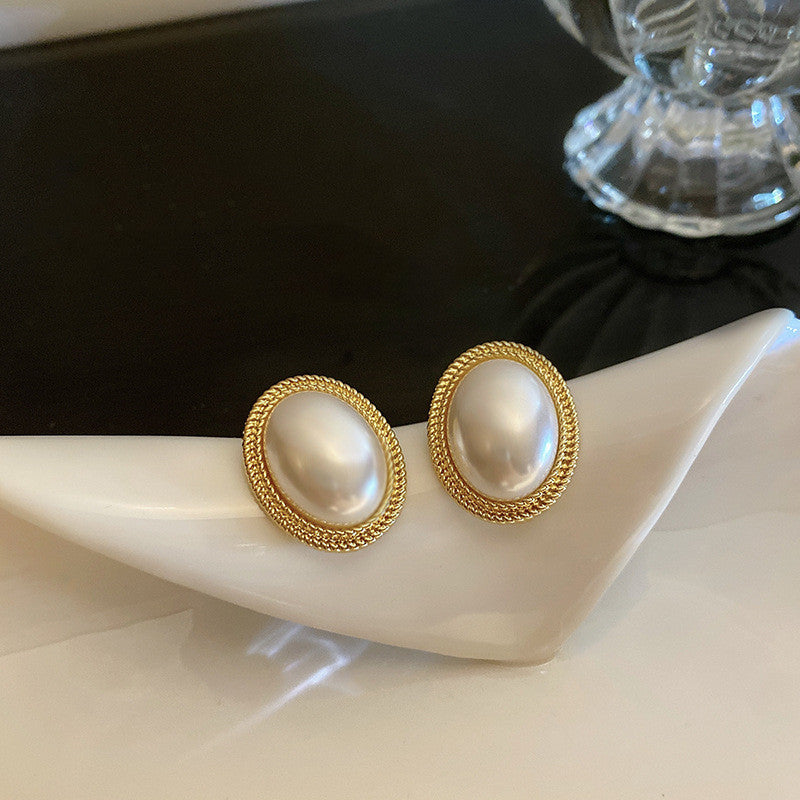 Radiance pearl stud earrings pearl detail close-up