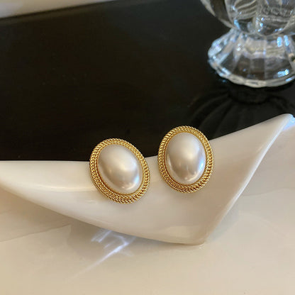 Radiance pearl stud earrings pearl detail close-up