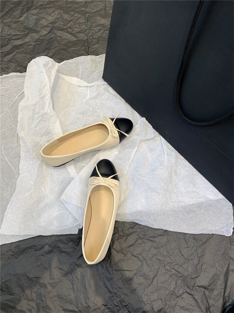 Women's flat bowknot ballet shoes close-up