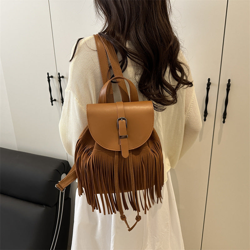 Retro bohemian style bag strap detail