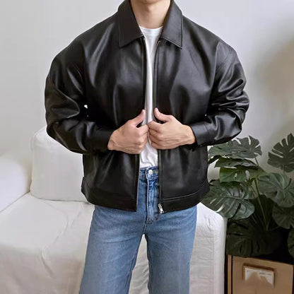Men's leather moto baseball jacket fabric close-up