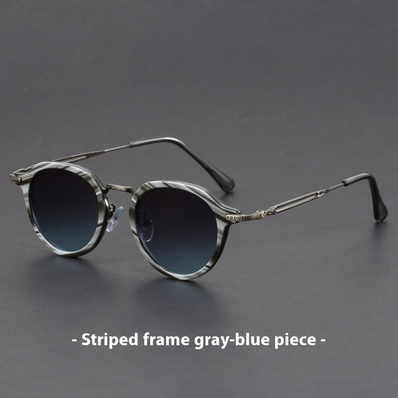 UV circle frame sunglasses on model