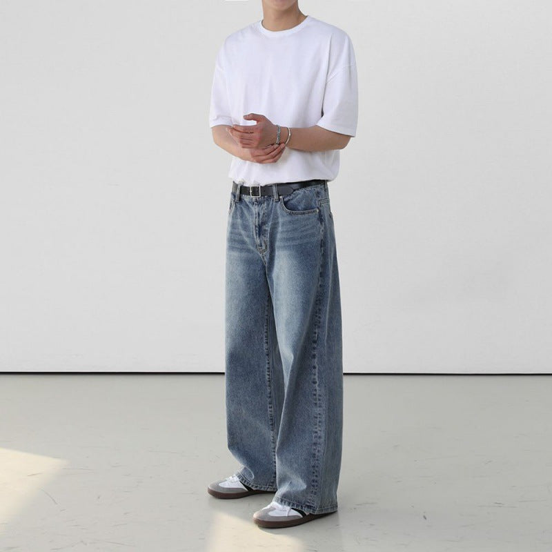 Men's retro washed jeans close-up detail