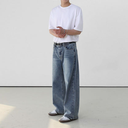 Men's retro washed jeans close-up detail