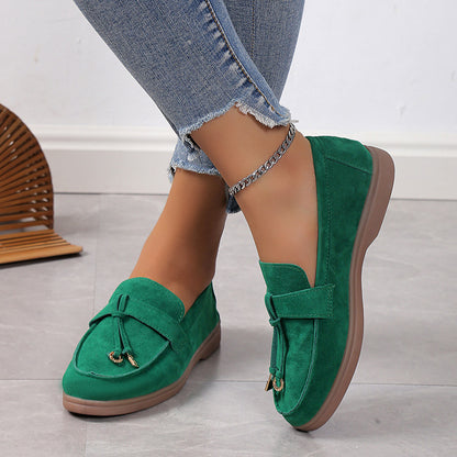 Women's suede lady loafers close-up detail