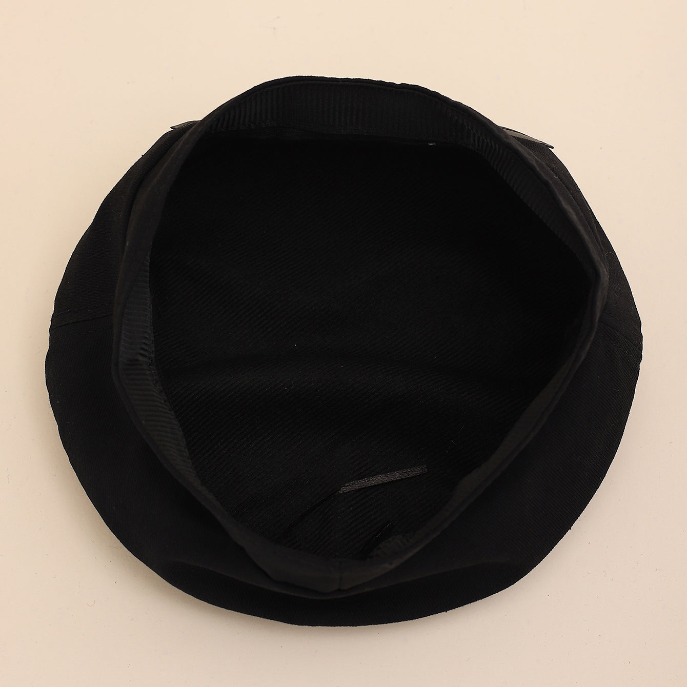 Leather button baseball cap side view