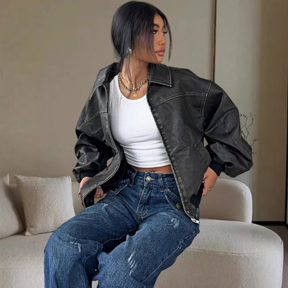 Women's distressed leather jacket back view