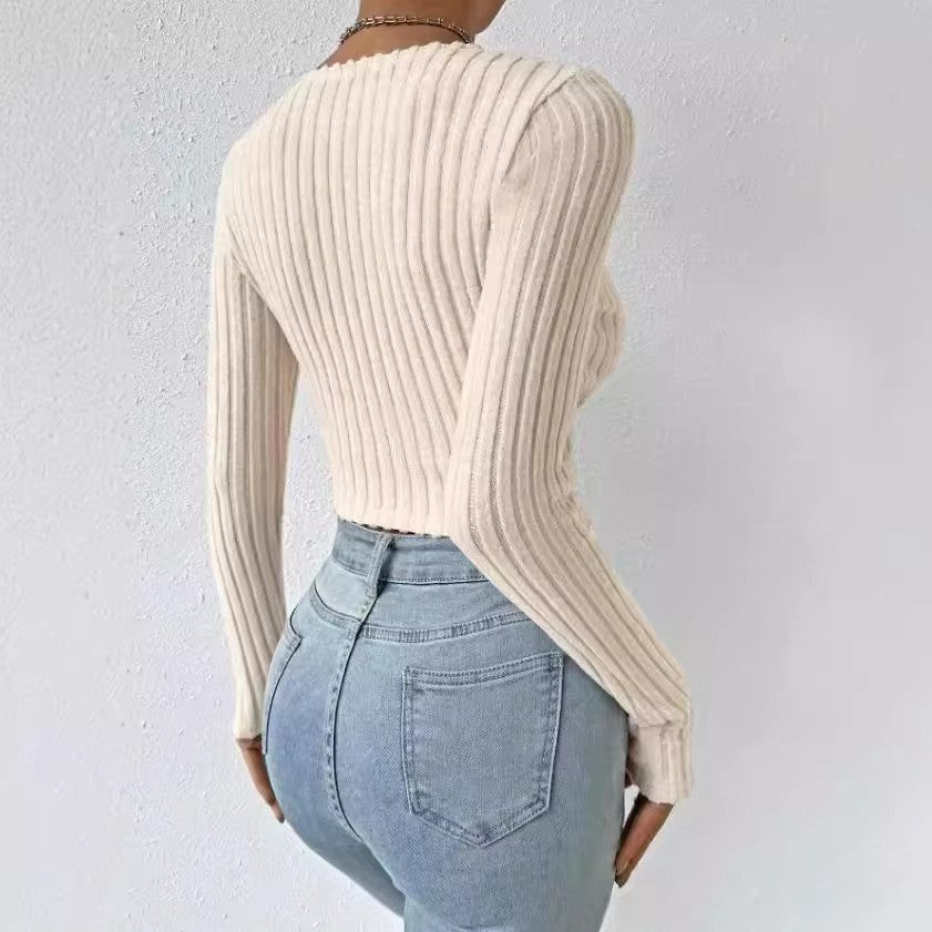 Deep V slim knit sweater neckline detail