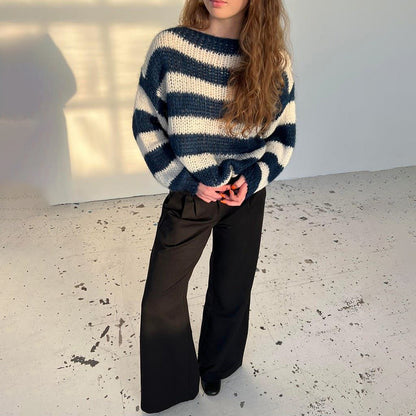 Loose striped knit sweater back view